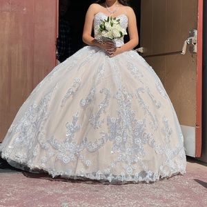 Enchanting Quincecrystal beading and three-dimensional floral laceon floral